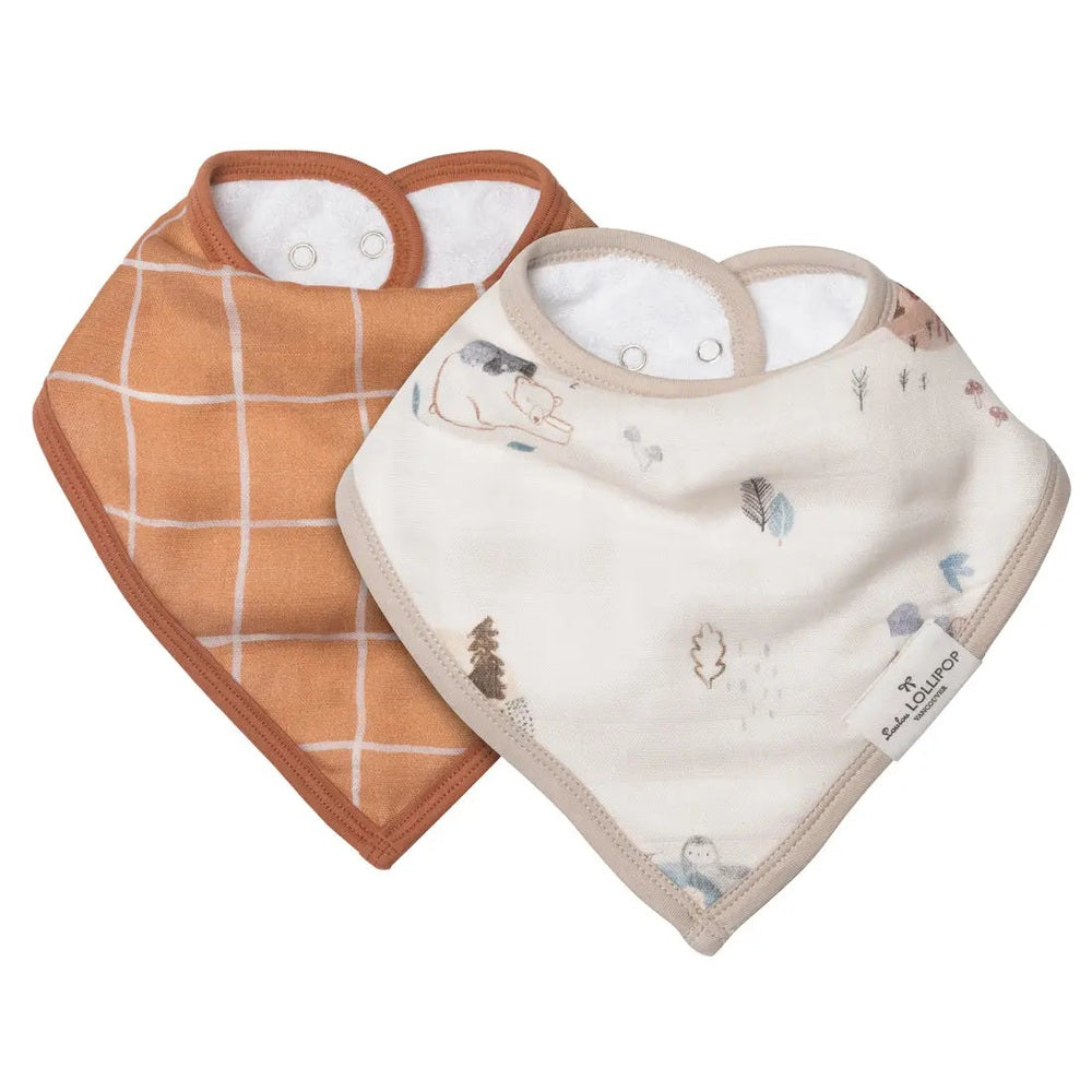 Loulou Lollipop Bandana Bib Set: two baby bibs in terracotta grid and cream forest print with snap closures for easy mealtime mess control.