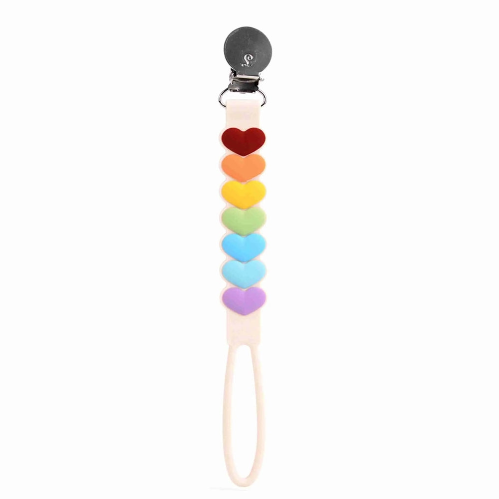 Loulou Lollipop Beadless Pacifier Clip, rainbow heart beads on beige strap, metal clip attaches to clothing to hold a pacifier