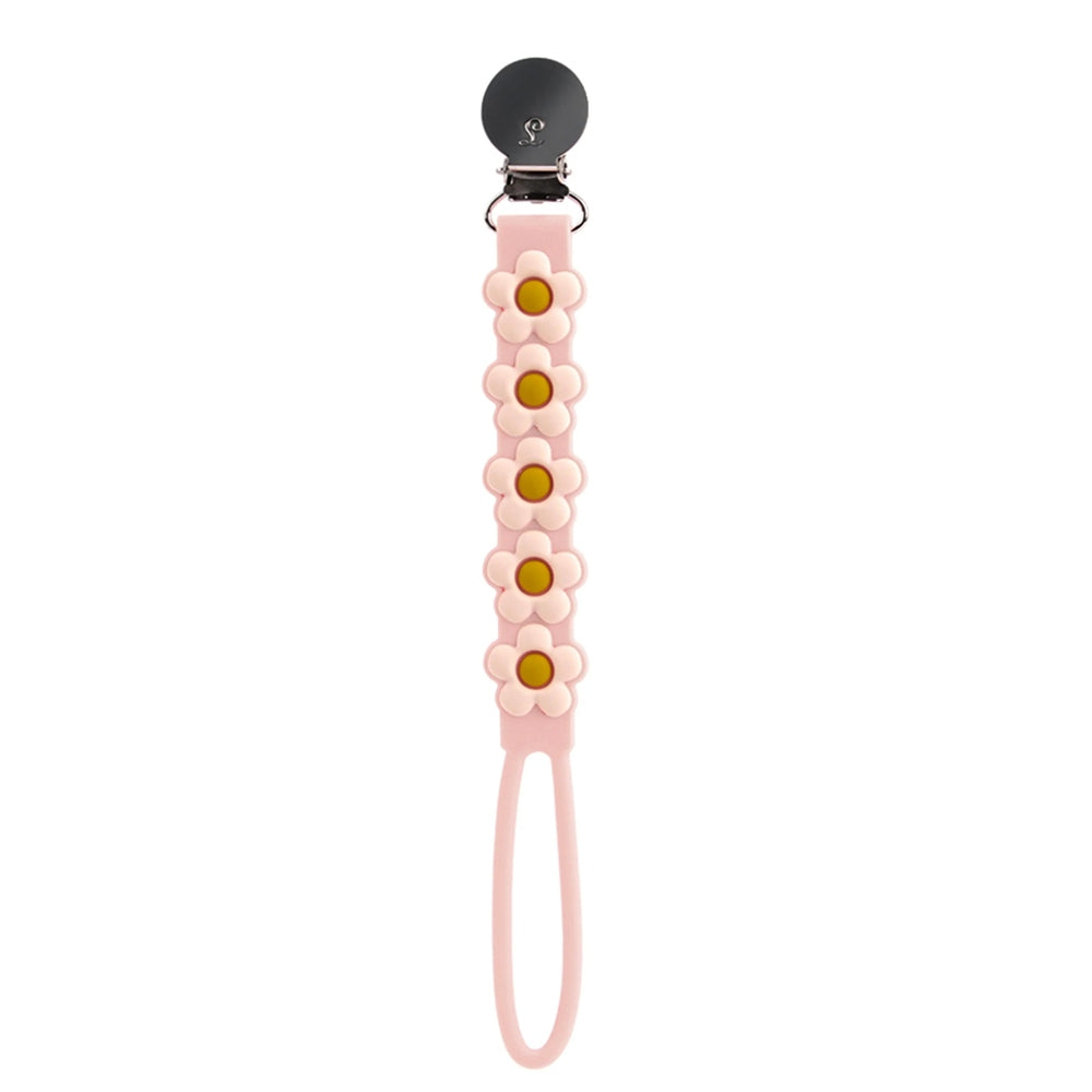 Loulou Lollipop Beadless Pacifier Clip in pink silicone with daisy flowers; metal clip attaches to clothing and pink loop holds the pacifier.