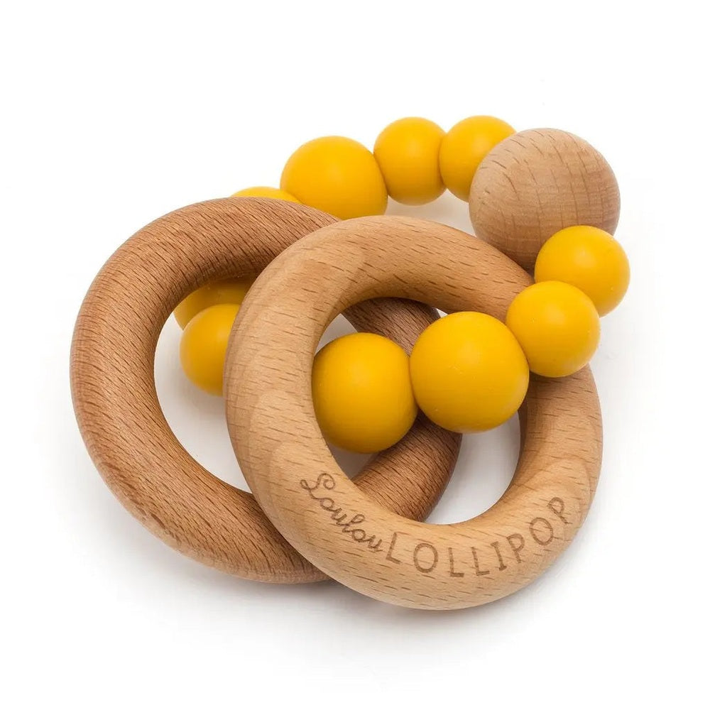Loulou Lollipop Bubble Silicone And Wood Teether with two interlocking wood rings and yellow beads