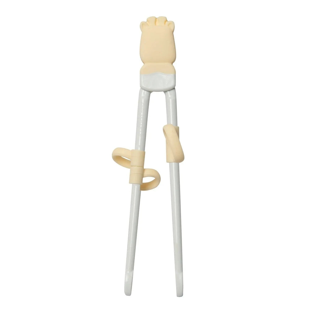 LOULOU LOLLIPOP Chopsticks for babies with beige silicone grips and safety rings aiding tiny hands to grasp food.