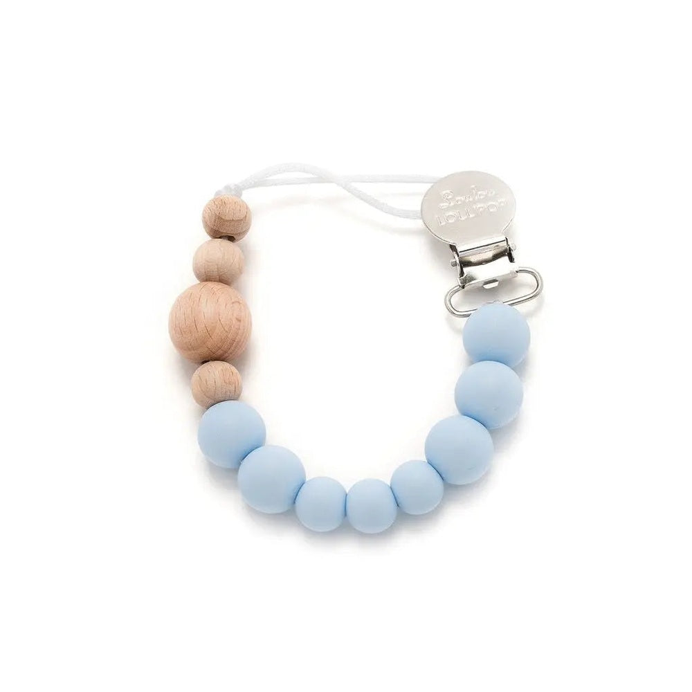 Loulou Lollipop Colour Block Silicone & Wood Pacifier Clip with blue silicone and natural wood beads, metal clip attached.