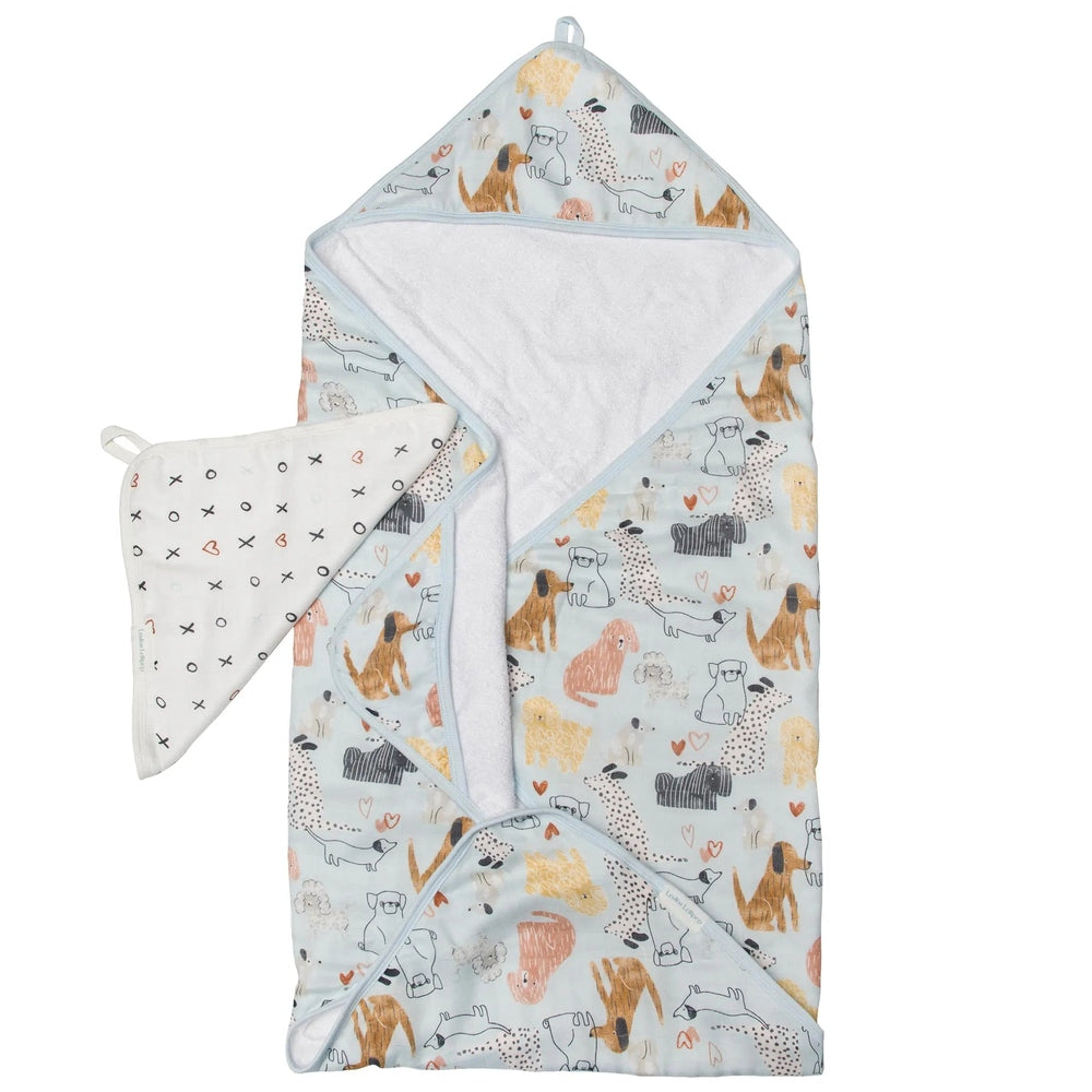 Loulou Lollipop Hooded Towel Set in pastel blue dog print, hooded towel draped open with matching white washcloth.