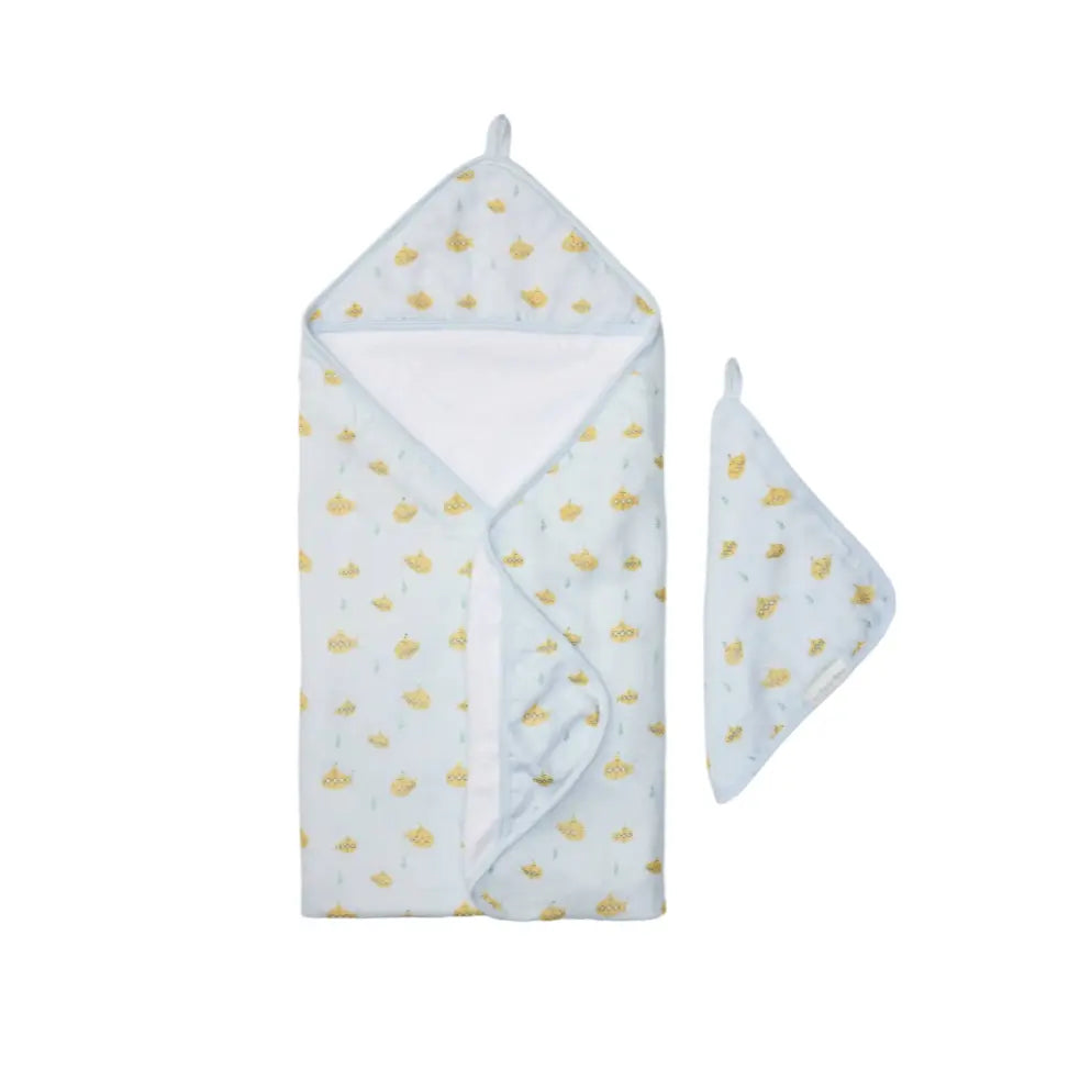 Loulou Lollipop Hooded Towel Set for babies in pale blue with yellow print, showing a hooded towel and washcloth laid out.