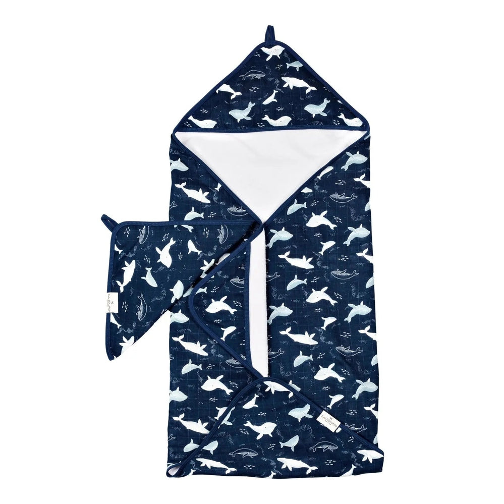 LOULOU LOLLIPOP Hooded Towel Set, navy sea-animal print, with a hooded towel and matching washcloth laid flat.
