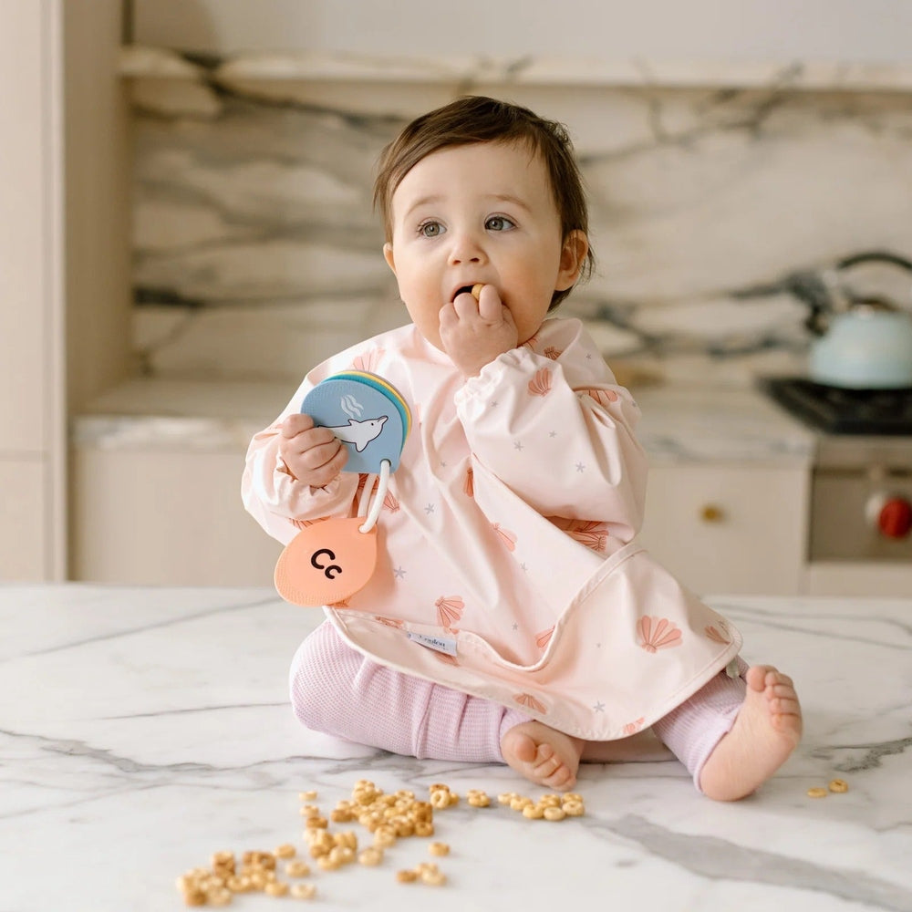 Loulou Lollipop Long Sleeve Bib Seashells in Pale Pink Seashell Pattern
