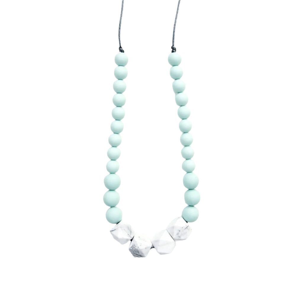 Loulou Lollipop teething necklace in robin's egg blue silicone beads with three white marble cubes