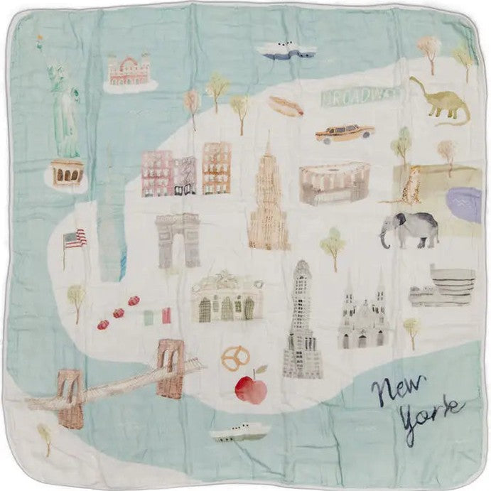 Loulou Lollipop Muslin Quilt Blanket with pastel New York City map, laid flat to show city landmarks.