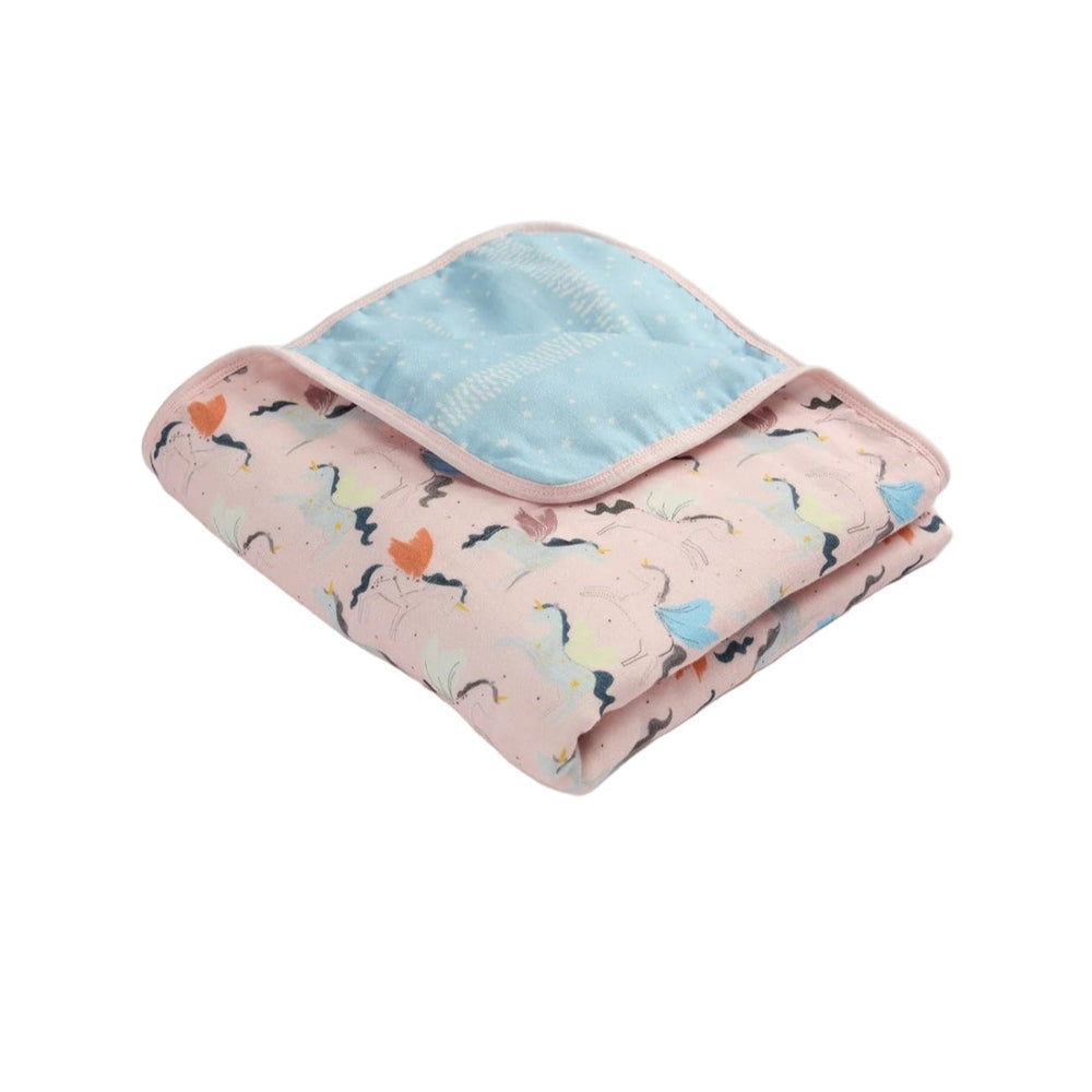 Loulou Lollipop Muslin Quilt Blanket, pink unicorn print with blue reverse, neatly folded for cozy swaddling.