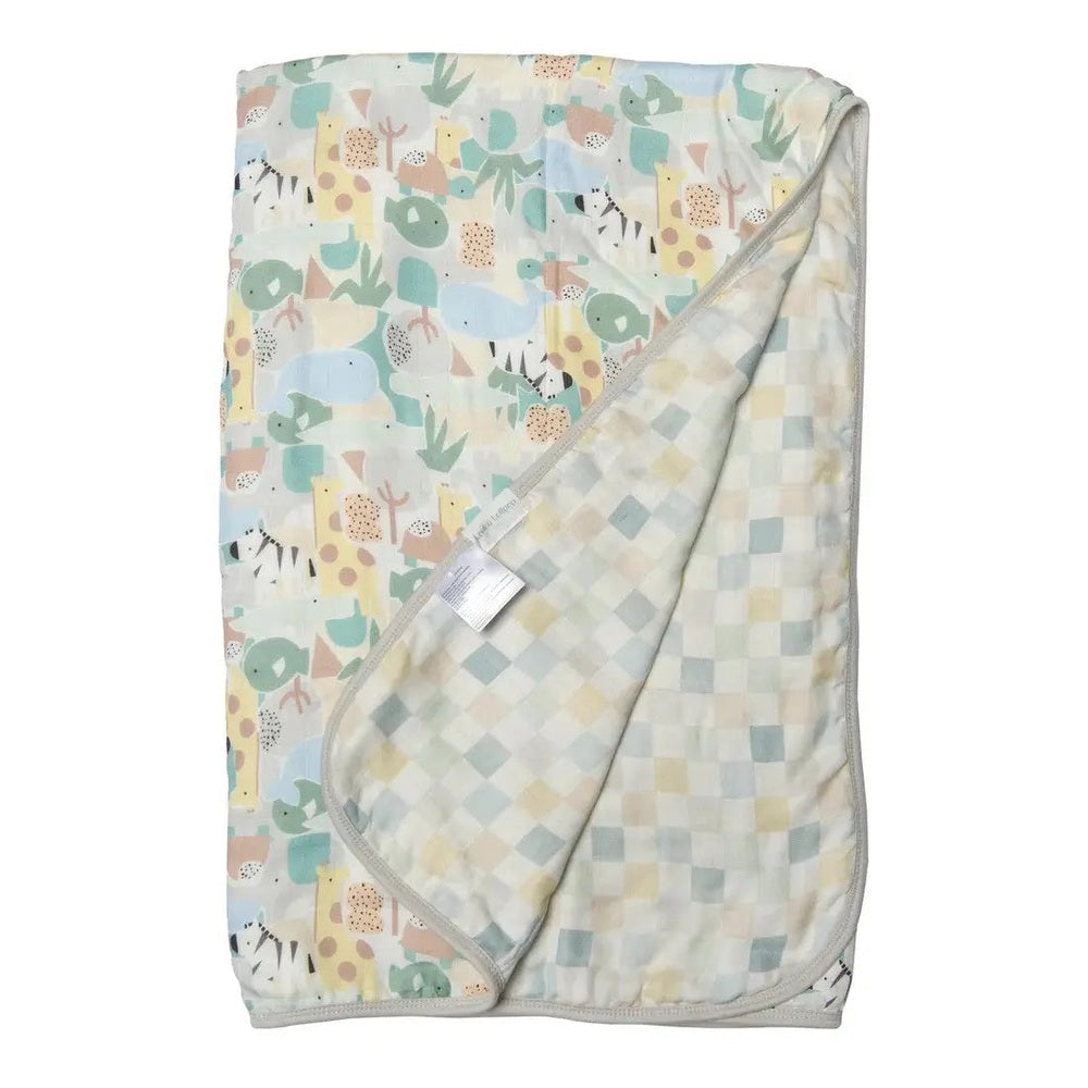 Loulou Lollipop Muslin Quilt Blanket in pastel animal print with a soft reversible checkered side.