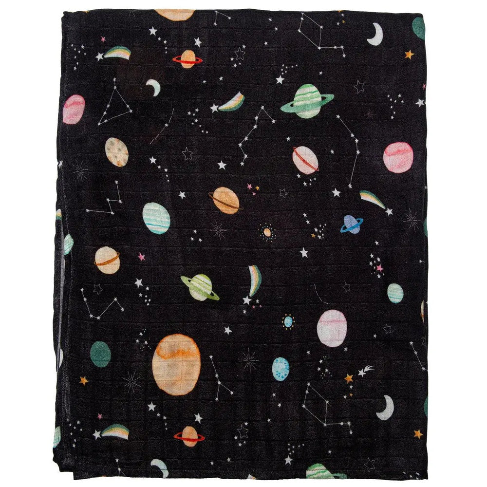 Loulou Lollipop Muslin Swaddle blanket in black space-print, showing soft breathable fabric and planet pattern.