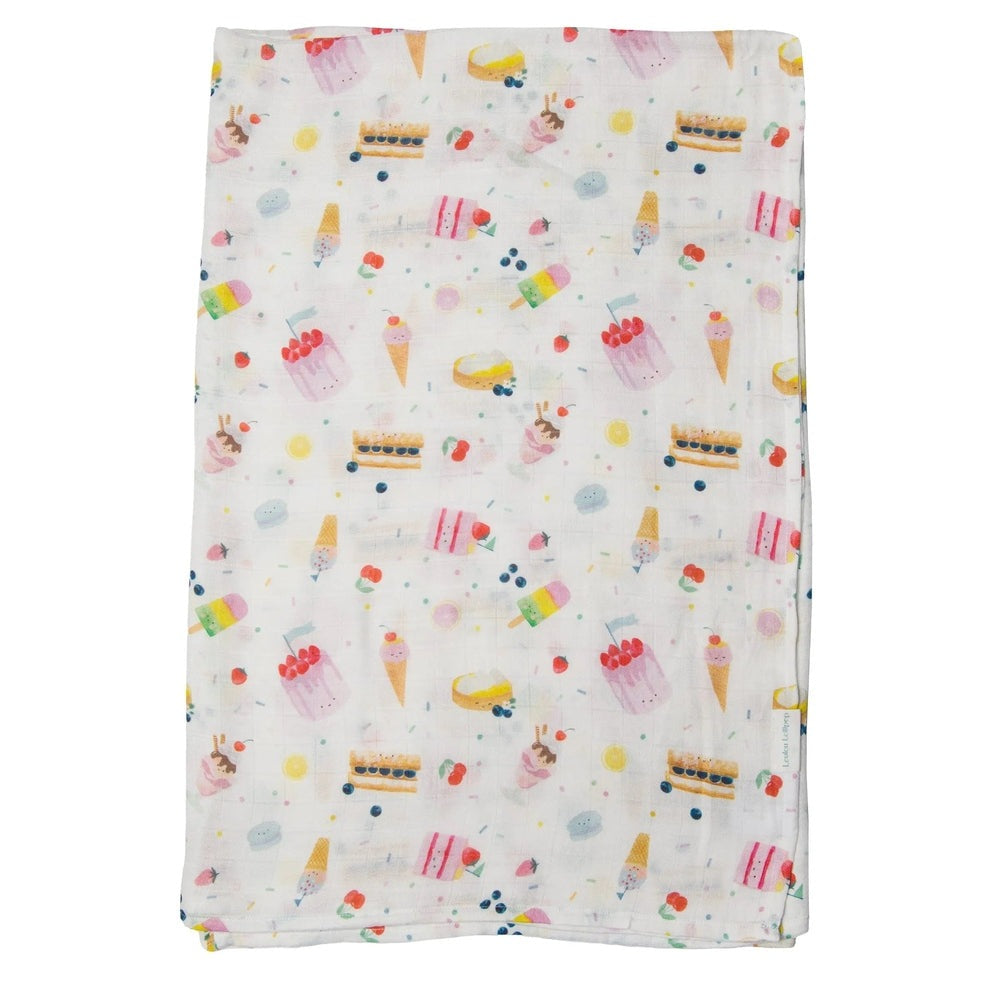 Loulou Lollipop Muslin Swaddle blanket, white with colorful ice cream and cake print, cozy baby wrap.