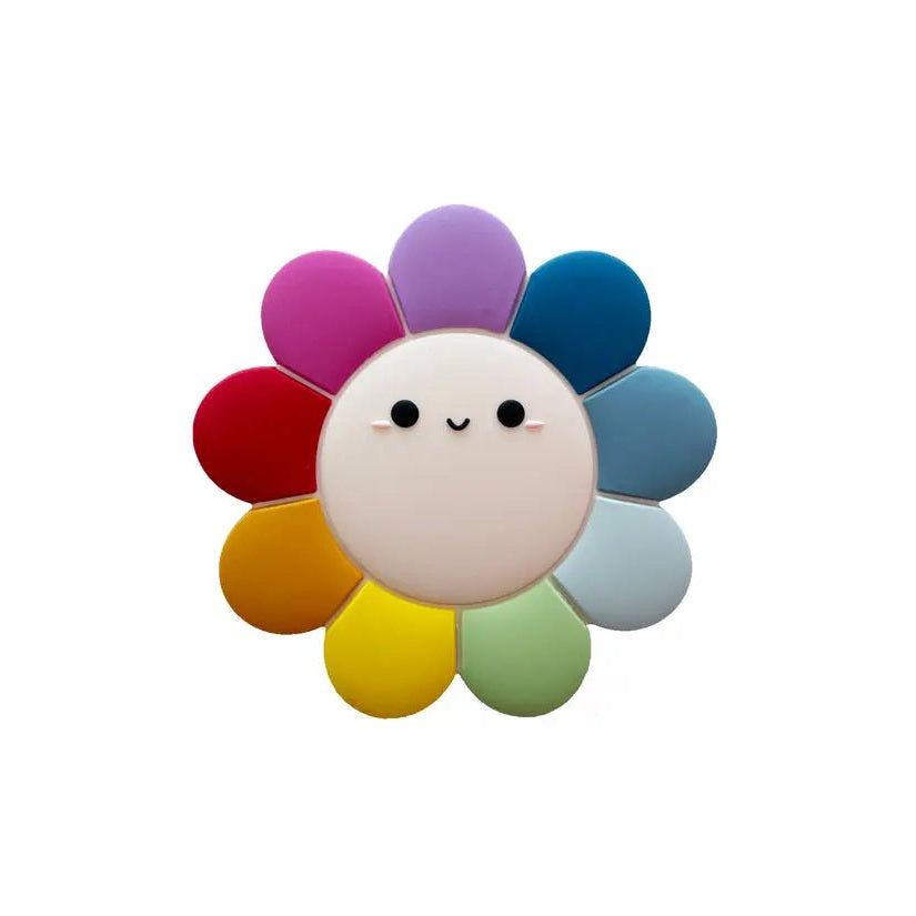 Loulou Lollipop Silicone Teether Daisy, rainbow-petal flower around a smiling center, baby-friendly silicone teether