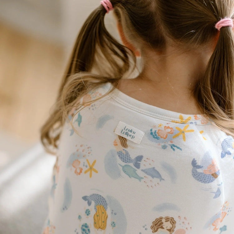 Loulou Lollipop sleepsuit 1.0 Tog Mermaids, back view in white fabric with pastel mermaid print