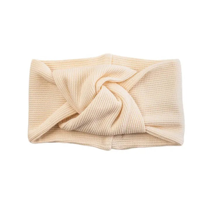 Loulou Lollipop Waffle Knotted Headband Coconut Milk in beige, soft textured fabric shown knotted.