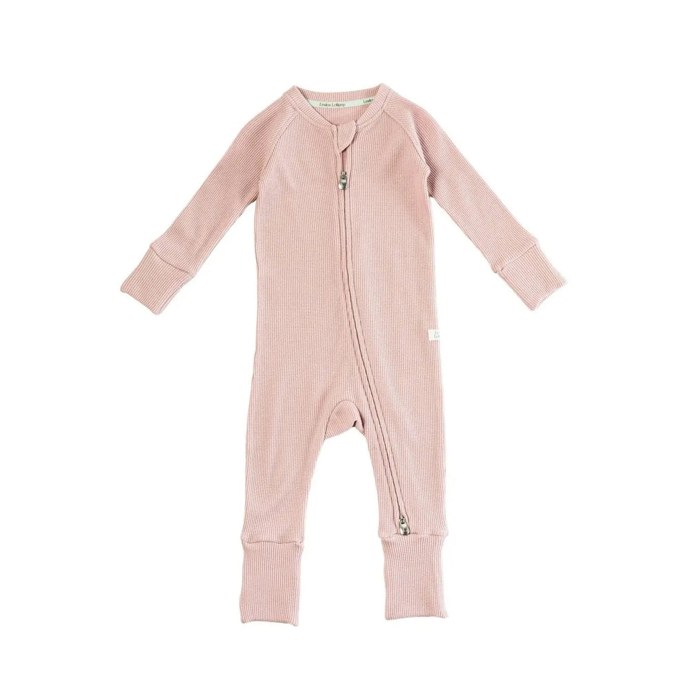 Loulou Lollipop Waffle Sleeper Blush Pink one-piece baby sleepwear, zip-front with ribbed cuffs.