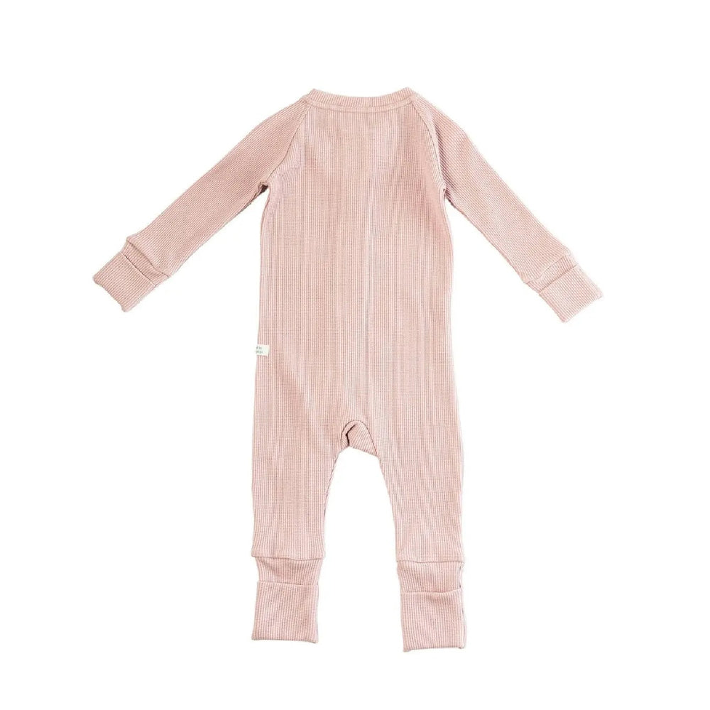 Loulou Lollipop Waffle Sleeper Blush Pink baby romper shown from back with long sleeves and footed cuffs.