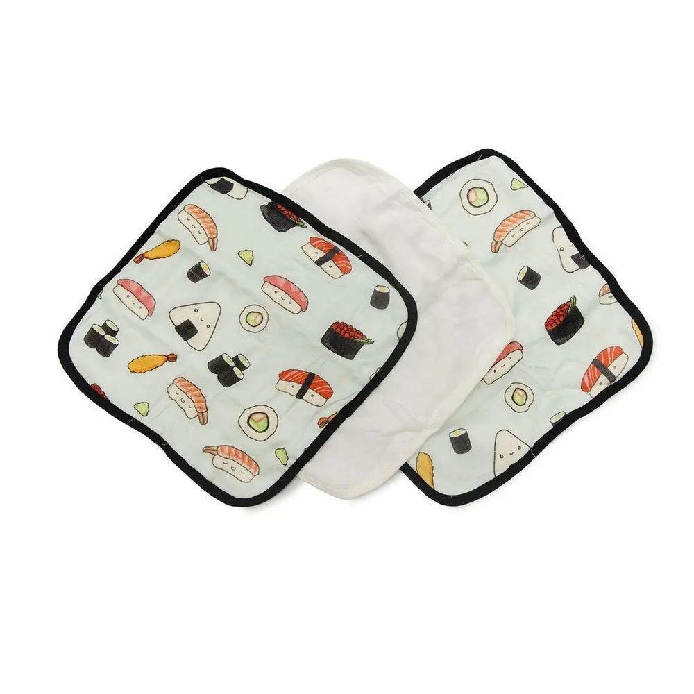 Loulou Lollipop Washcloth 3-Piece Set; pale mint sushi-print cloths with black trim laid flat for bath time use