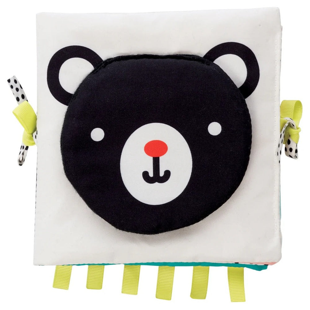 Manhattan Toy Wimmer Seek & Peek Book, a soft square baby toy with a black bear face and colorful ribbon tabs.