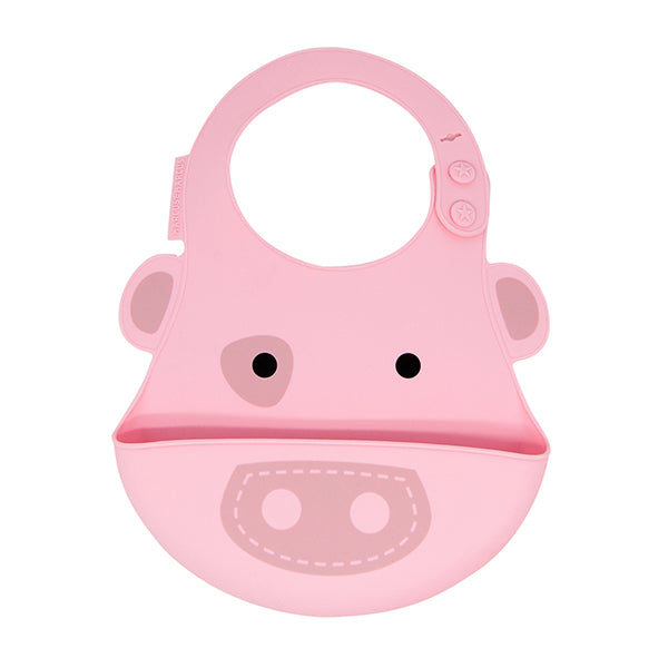 Marcus & Marcus baby bib in pink silicone with front pocket and cute face design