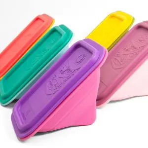 Marcus & Marcus Collapsible Sandwich Container set, pink/purple/teal/yellow with lids, shown collapsed for compact storage.