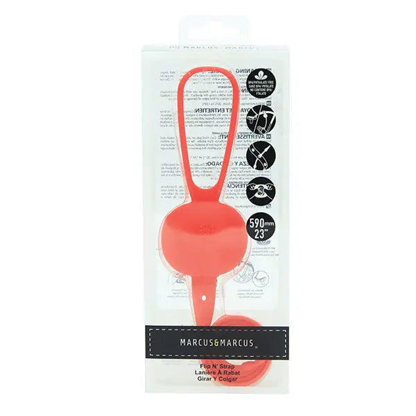 Marcus & Marcus Flip N' Strap red silicone feeding accessory with loop handle inside packaging.