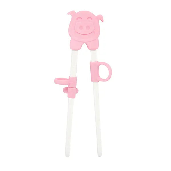 Marcus & Marcus Learning Chopsticks pink pig trainer with adjustable grip rings, two white sticks designed for toddlers.