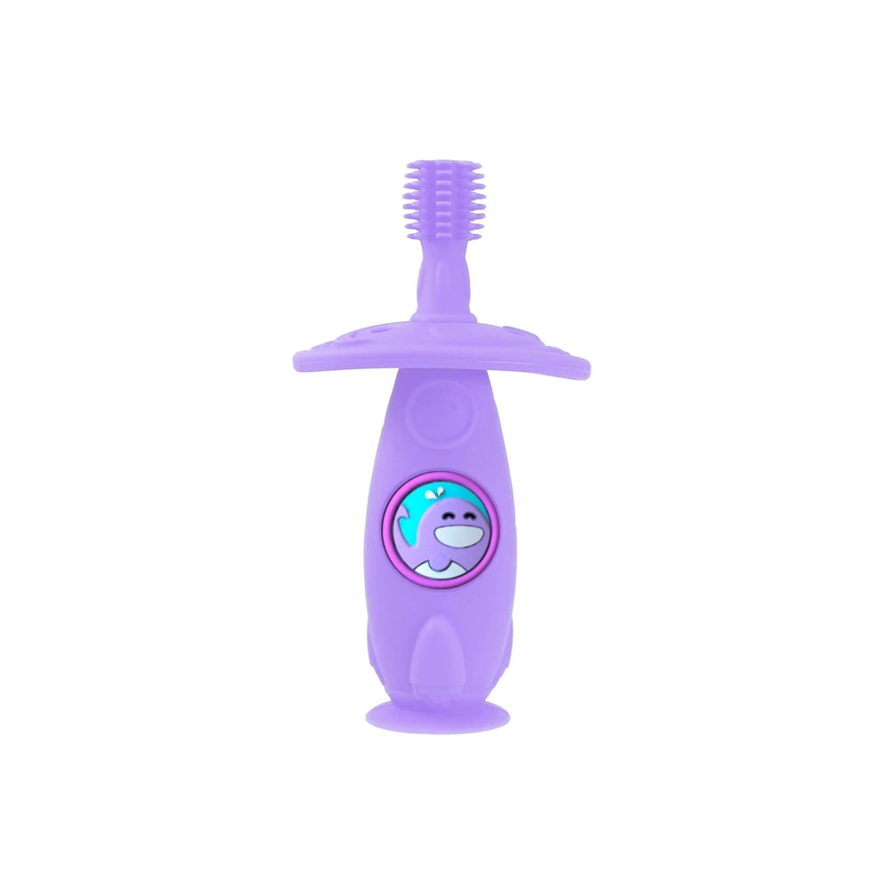 Marcus & Marcus Self Training 360 Toothbrush in purple, suction base attached to surface with rotating head.