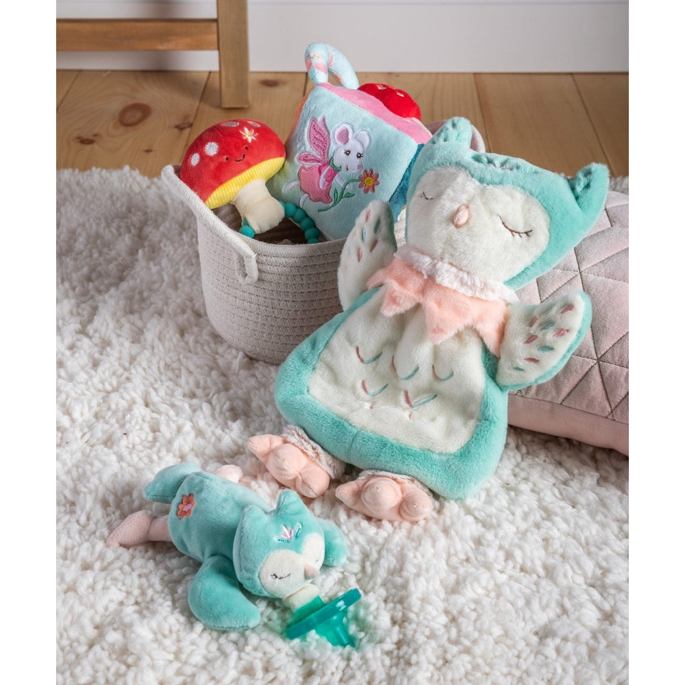 Mary Meyer Fairyland Mushroom Teether Rattle; turquoise plush mushroom with bunny in a basket