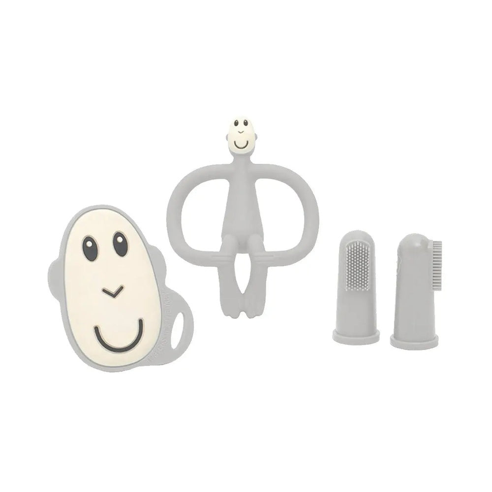 Matchstick Monkey Starter Set teether in grey with a smiling monkey figure gripping a ring and two textured ends.