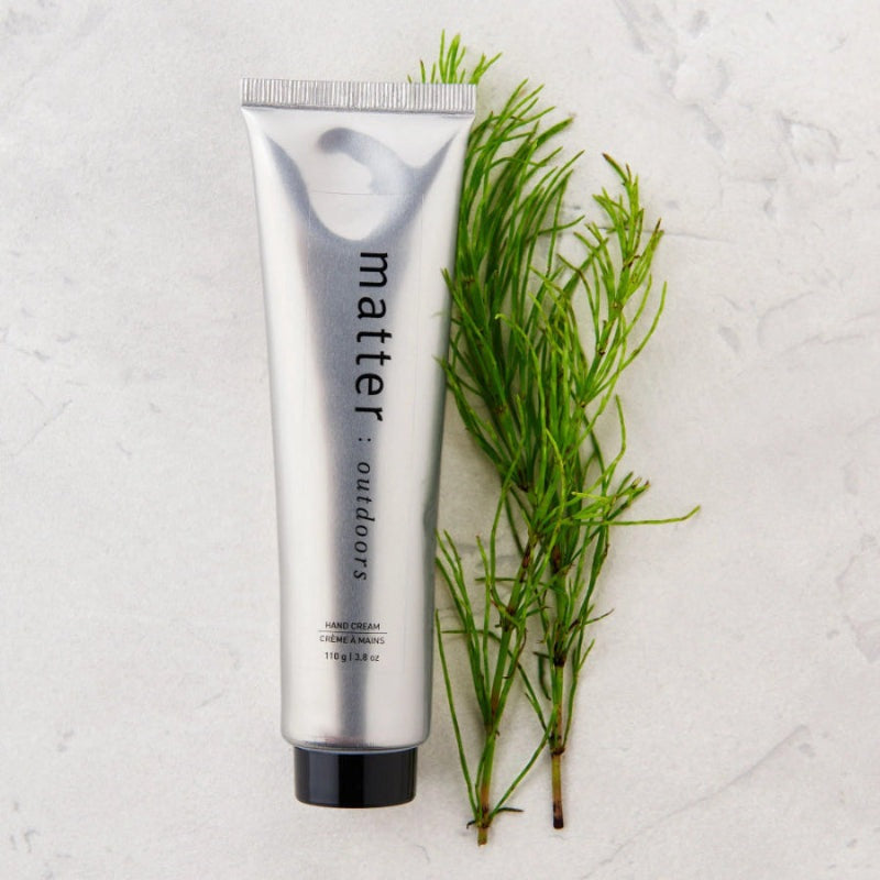 Matter Company hand cream 3.8 oz in silver tube with black cap, rosemary sprigs