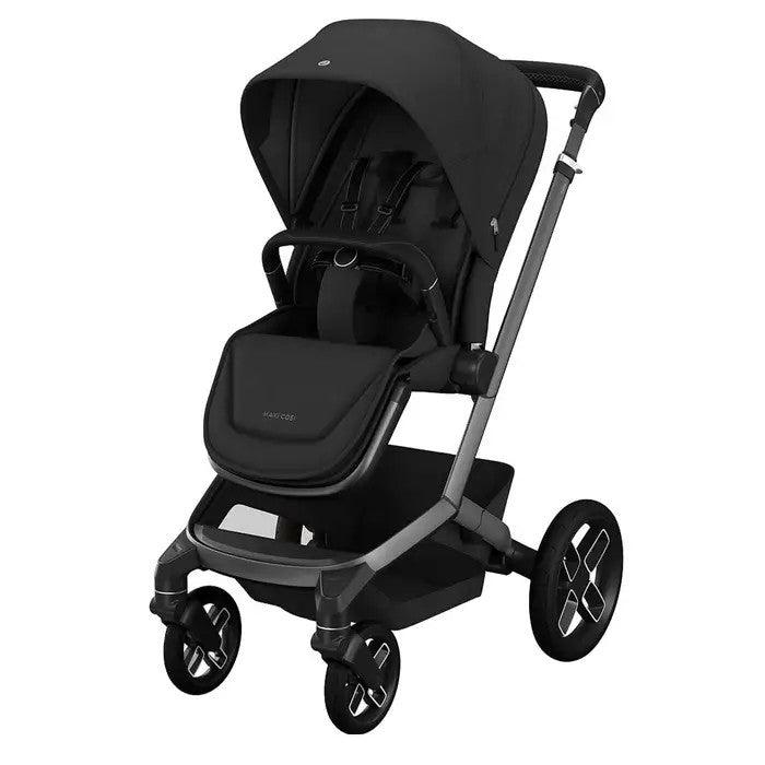 MAXI COSI Fame stroller in black with canopy extended, padded seat, and visible front storage pouch