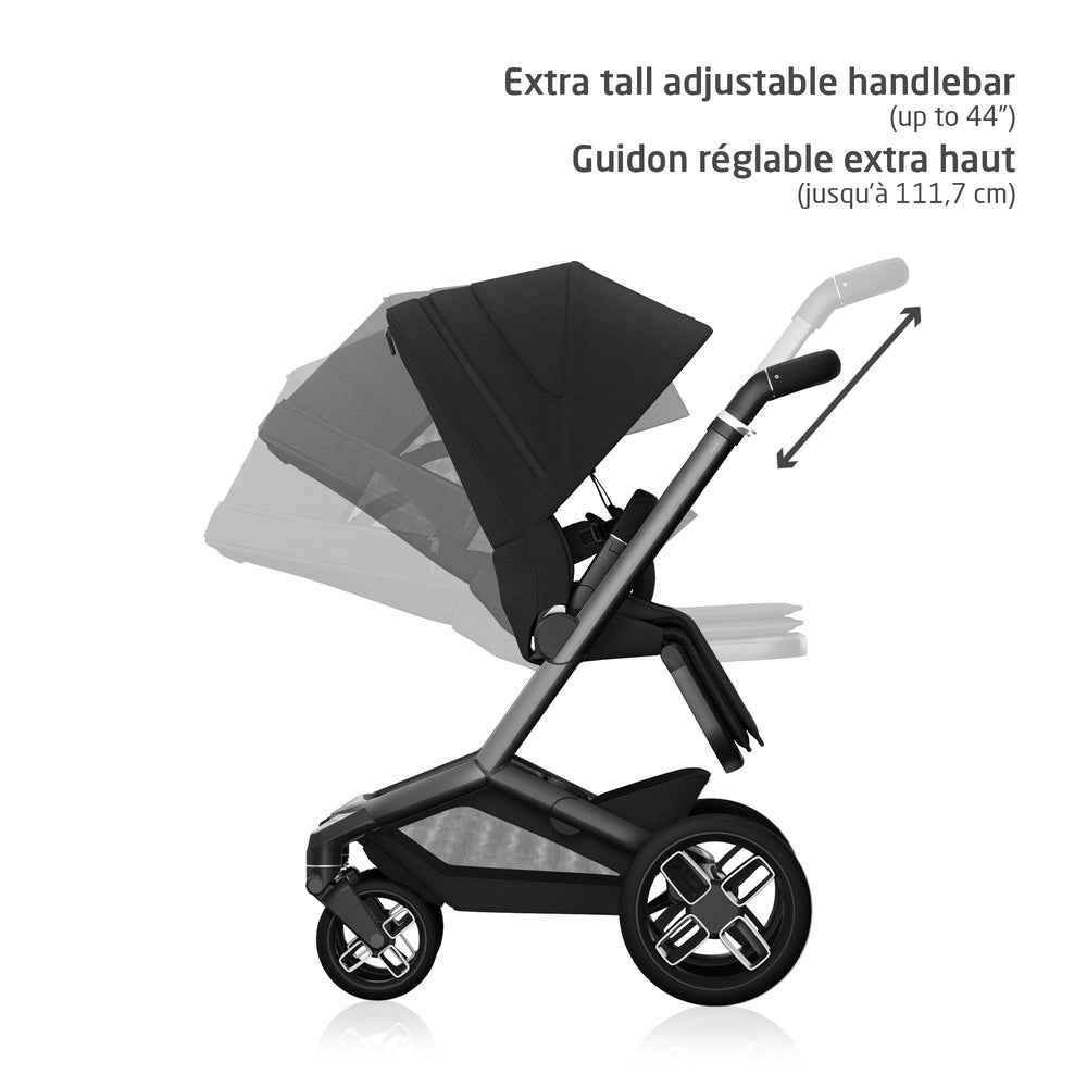 Black fabric stroller with tall gray adjustable handlebar, three wheels and extended canopy.