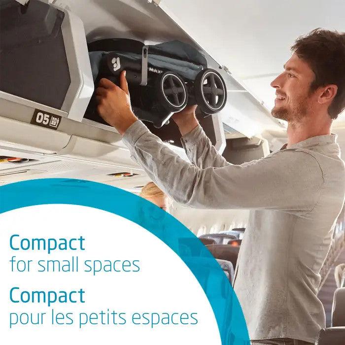 Maxi-Cosi Lara Ultra Compact Stroller being stowed overhead in airplane cabin; compact baby stroller by MAXI COSI.