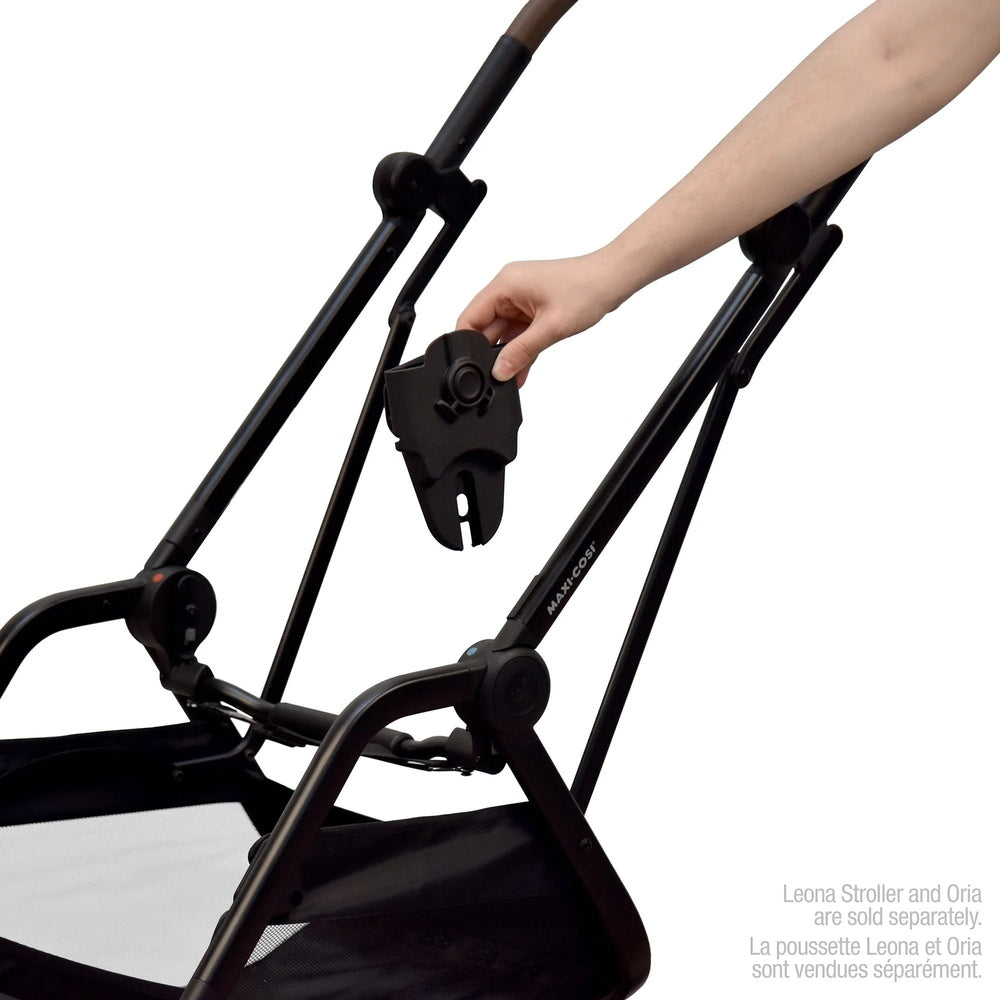 MAXI COSI Leona stroller Oria adapters in black being attached to a stroller frame