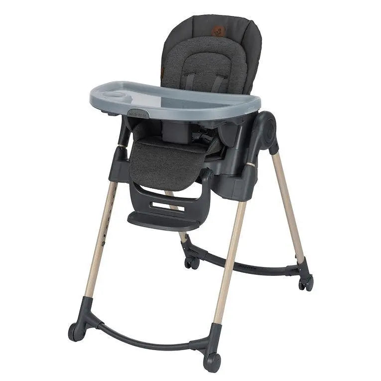 Maxi Cosi Minla 6-in-1 high chair in charcoal with gray tray, tray attached and wheeled for easy meals.
