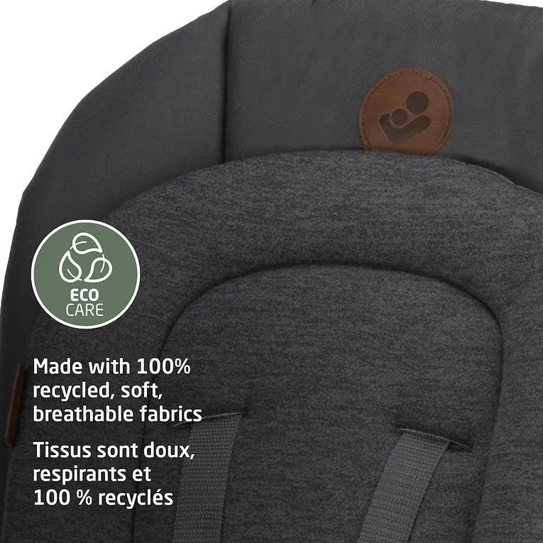 MAXI COSI Minla 6-in-1 high chair in dark grey fabric with harness straps; Eco Care badge says 100% recycled fabrics.