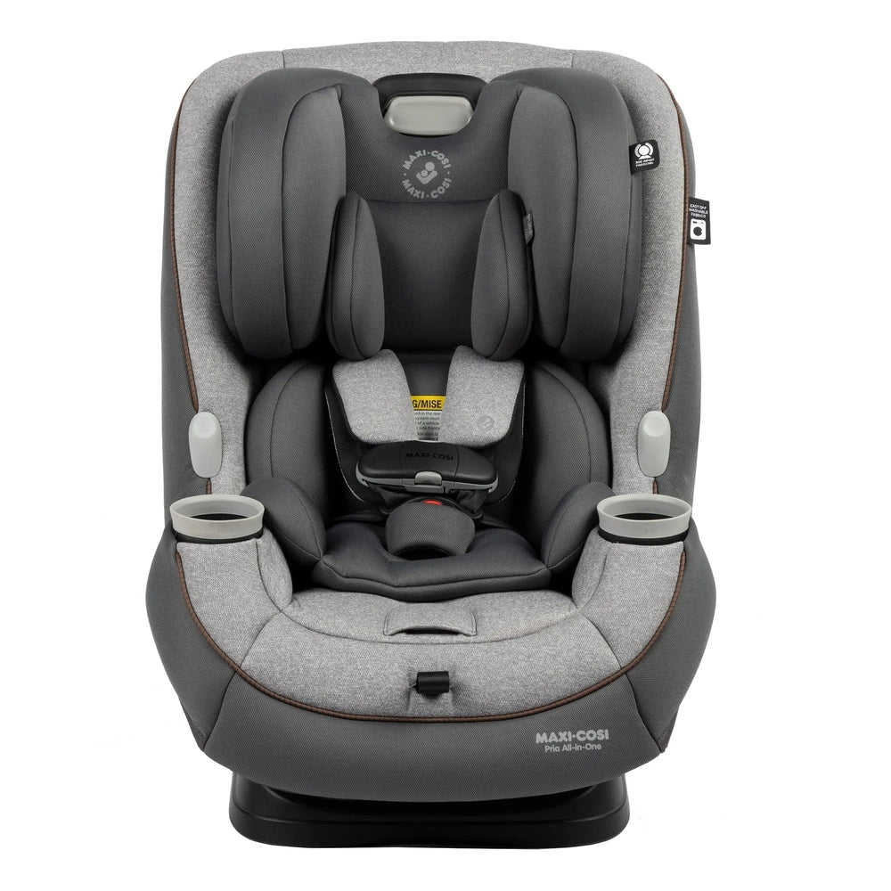 Maxi-Cosi Pria All-In-One convertible car seat in gray fabric with padded headrest; dual cup holders shown.