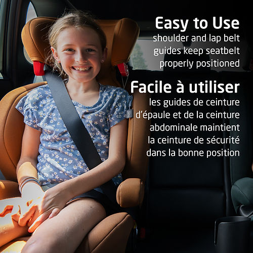 Maxi Cosi Rodisport booster car seat in orange-brown upholstery; child buckled with belt guides keeping belt properly positioned.