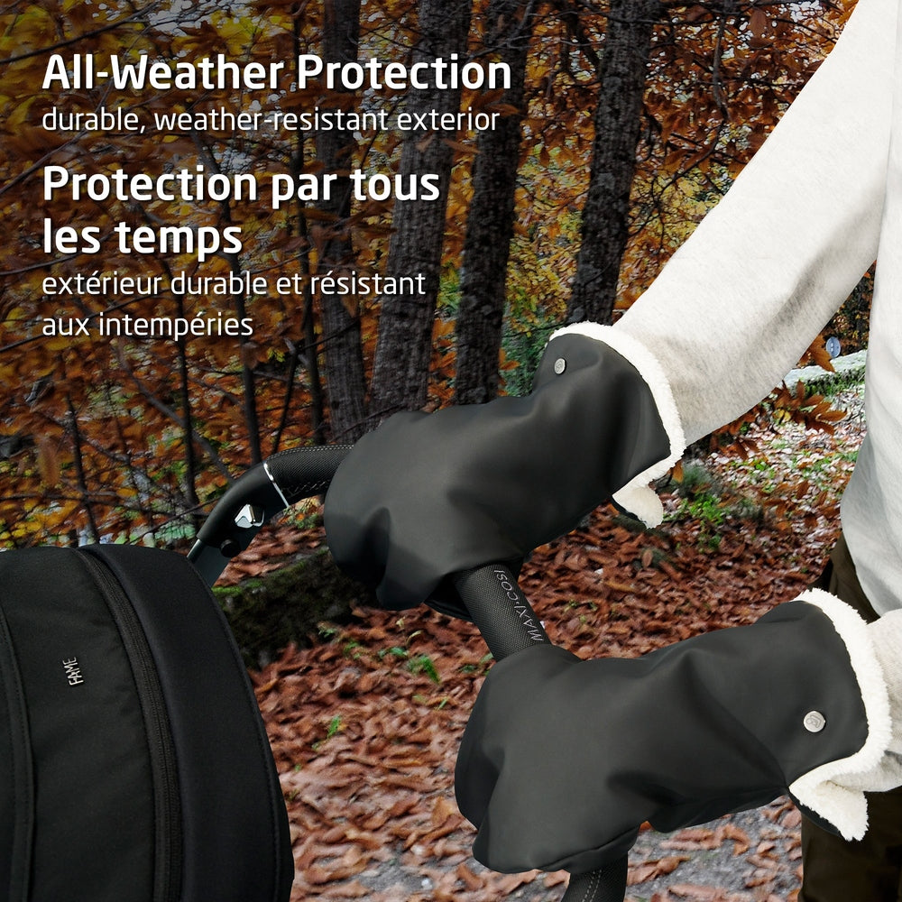MAXI COSI Stroller Gloves in black with faux shearling, keeping hands warm as a parent grips the stroller handle.