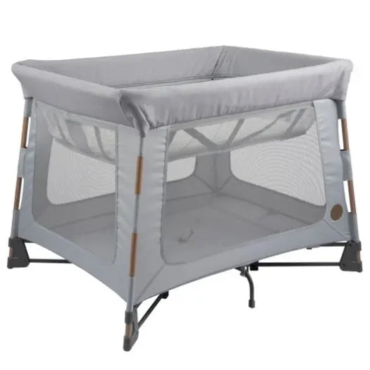 Maxi Cosi Swift Playard in grey with mesh panels, showing a sturdy frame for a portable bassinet and play yard