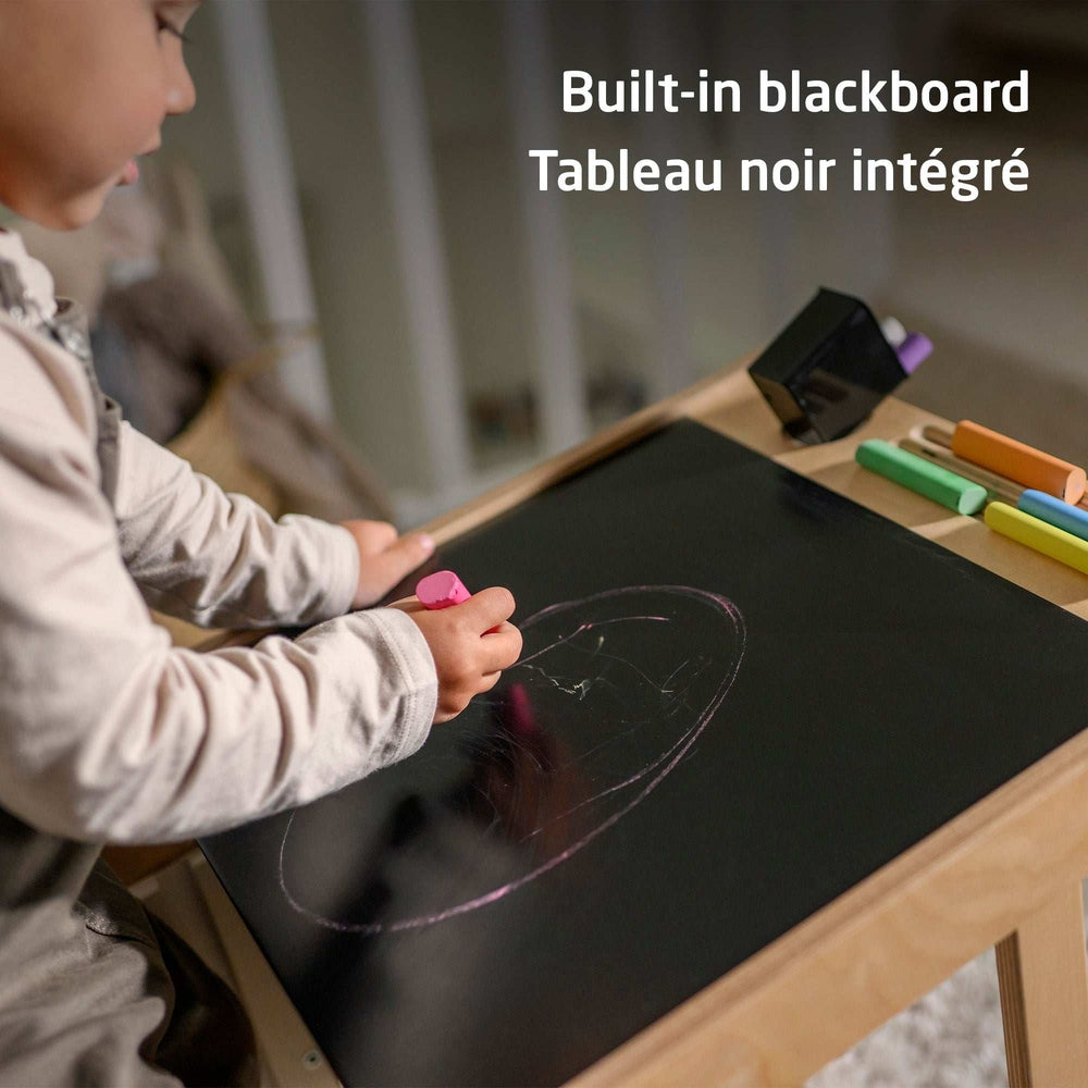 MAXI COSI Toucan 3-in-1 learning tower with built-in blackboard, natural wood frame, and colored chalks