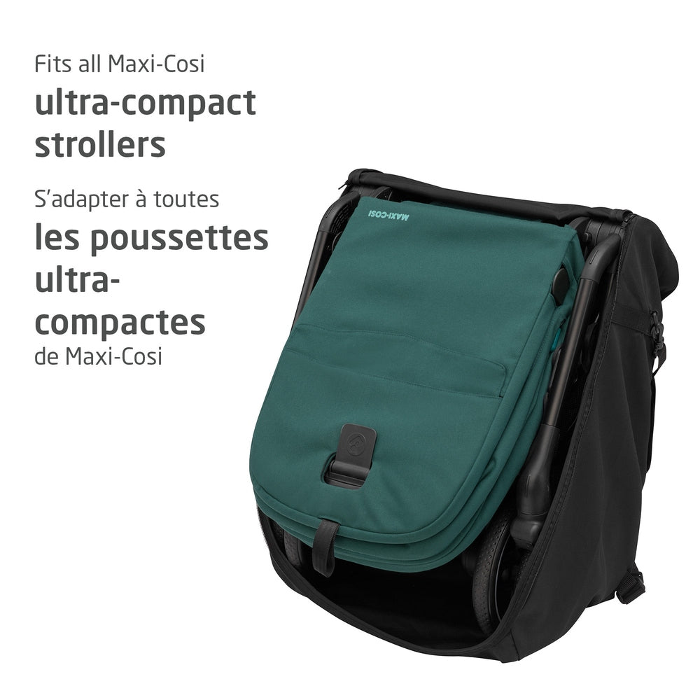 Maxi-Cosi Ultra Compact Travel Bag in teal attached to a collapsed stroller, demonstrating ultra-portable storage.