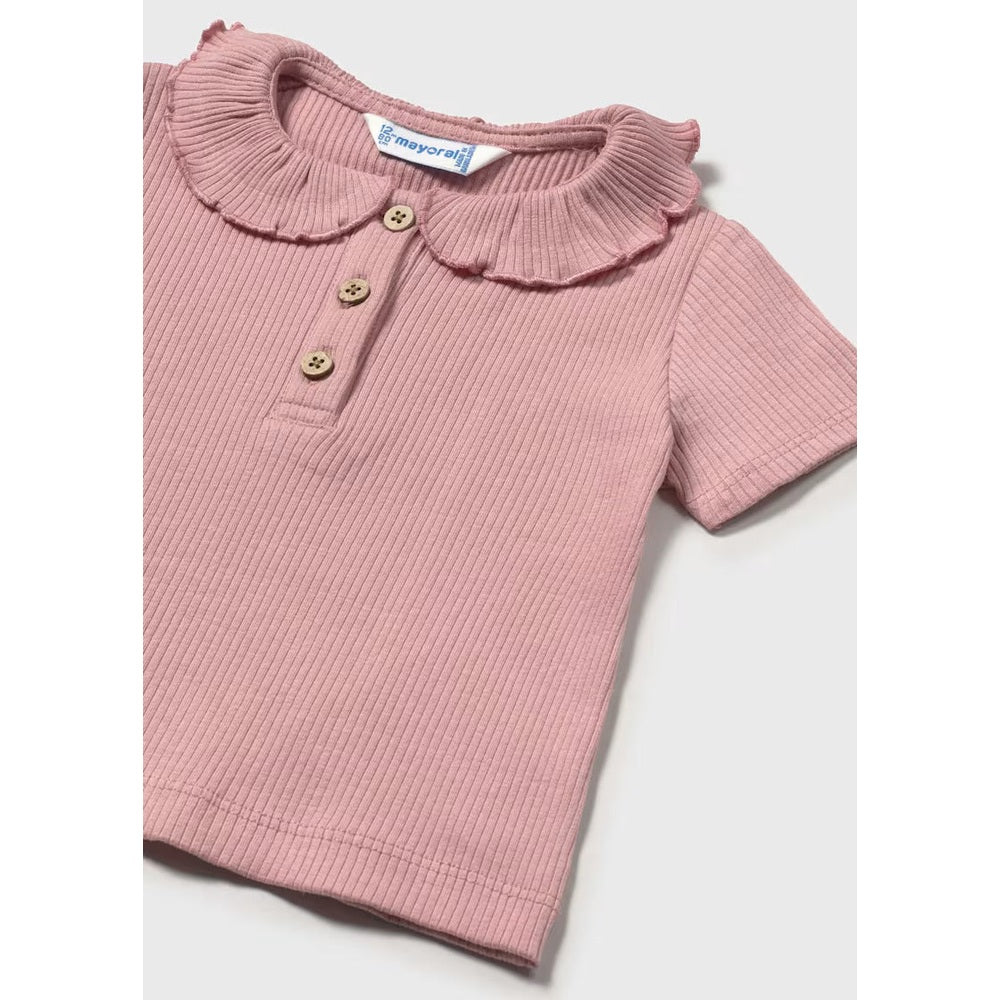 Mayoral Baby Ribbed Polo With Ruffle Collar Rose, pink ribbed knit polo displayed flat to show collar, buttons, and short sleeves.