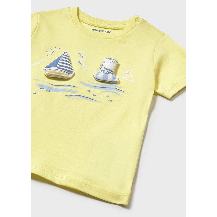Mayoral Baby Sailboat T-Shirt Sorbet Yellow with blue sailboat and bear patches sewn onto the front.