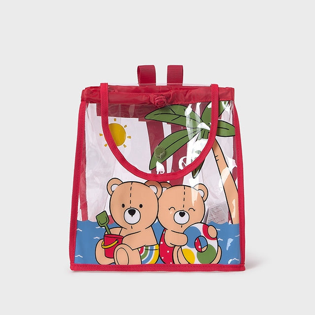 Mayoral Baby Transparent Beach Backpack, red trim, clear PVC shows toys inside as two bears play on the beach.