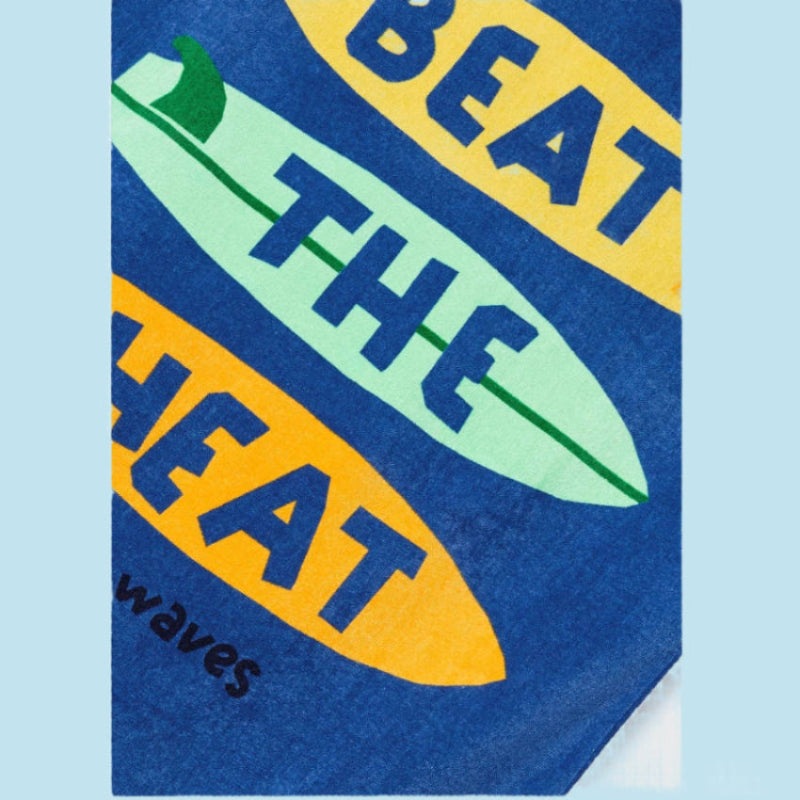 Mayoral Riviera Beach Towel; cotton baby towel with blue background and colorful surfboard graphics