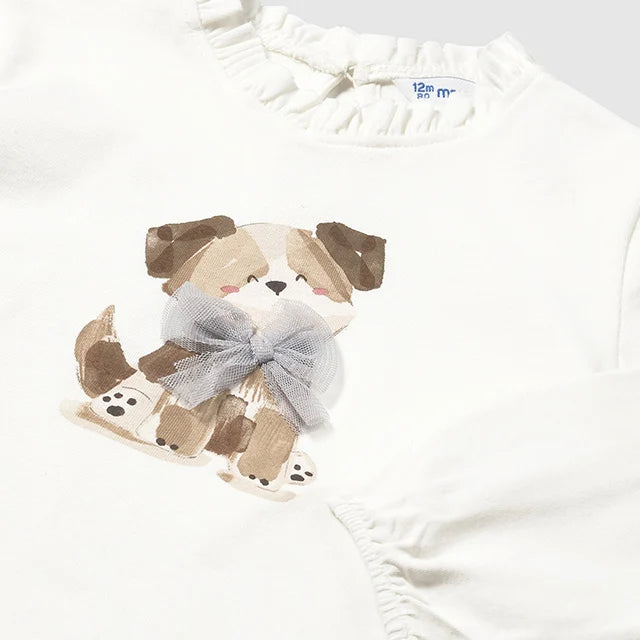 MAYORAL girls top in cream cotton with brown dog print and gray bow embellishment.