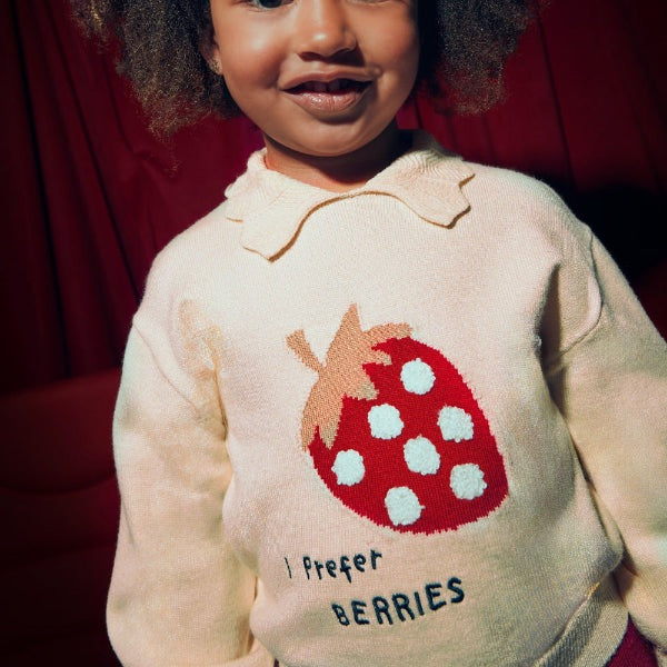 Mayoral Mini Girl Skirt Set Red two-piece on toddler wearing cream knit sweater with a strawberry graphic