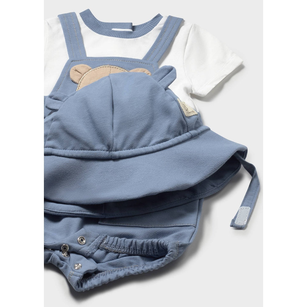 MAYORAL newborn bear-print simulated dungaree romper with hat in Riviera blue; blue dungaree features a bear applique.